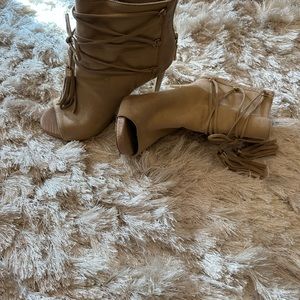 Bebe size 6 suede booties . Tan